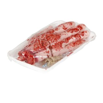 Blutige abgetrennte Hand in Wurstverpackung
